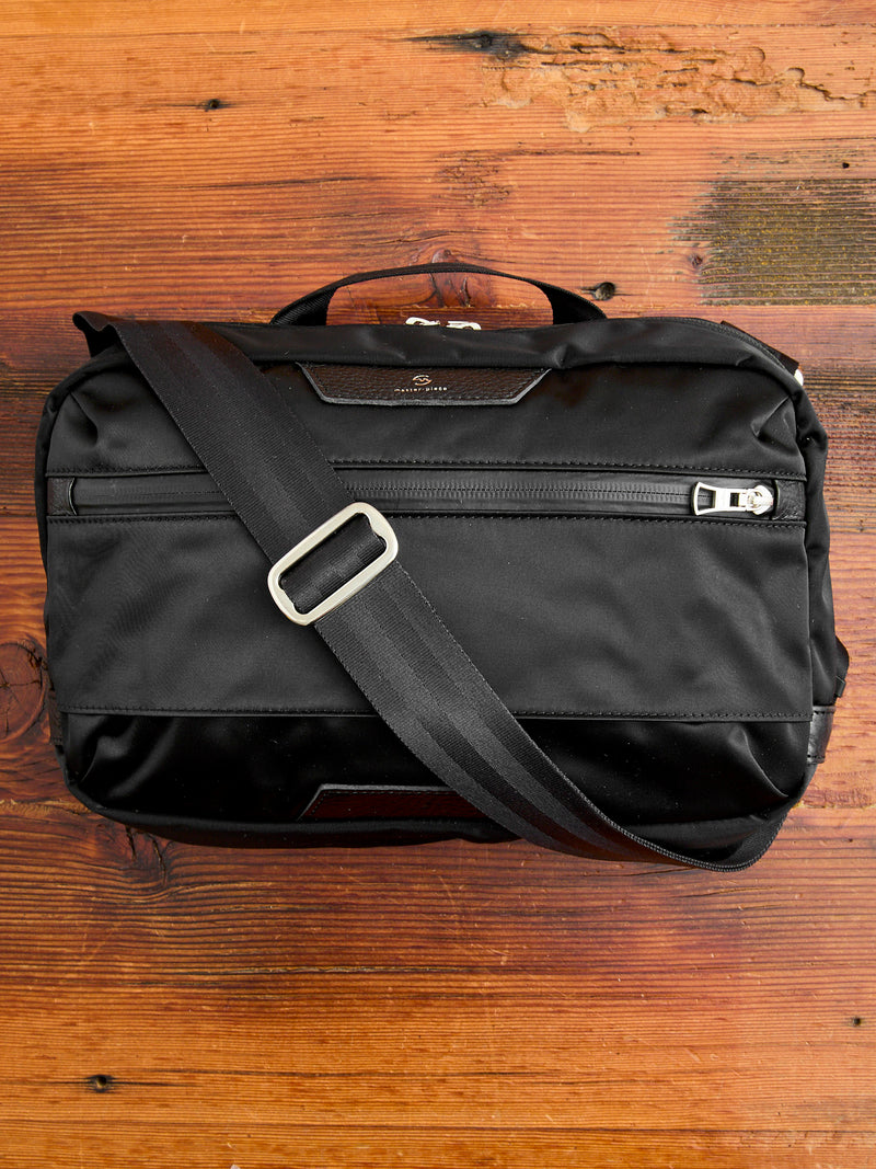 Progress Shoulder Carry Bag in Black