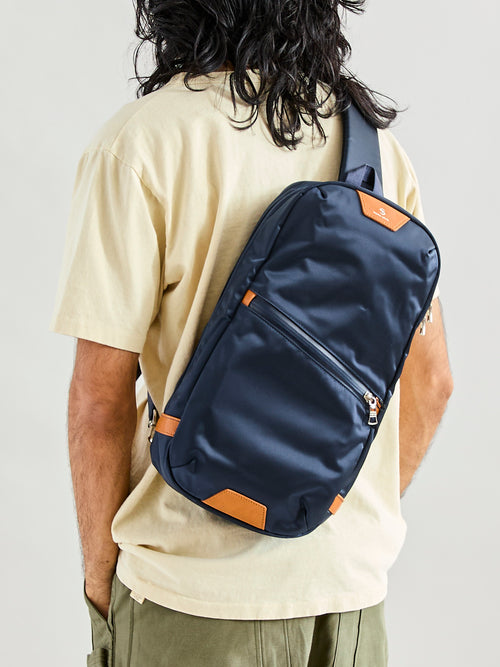 Progress Sling Bag in Navy